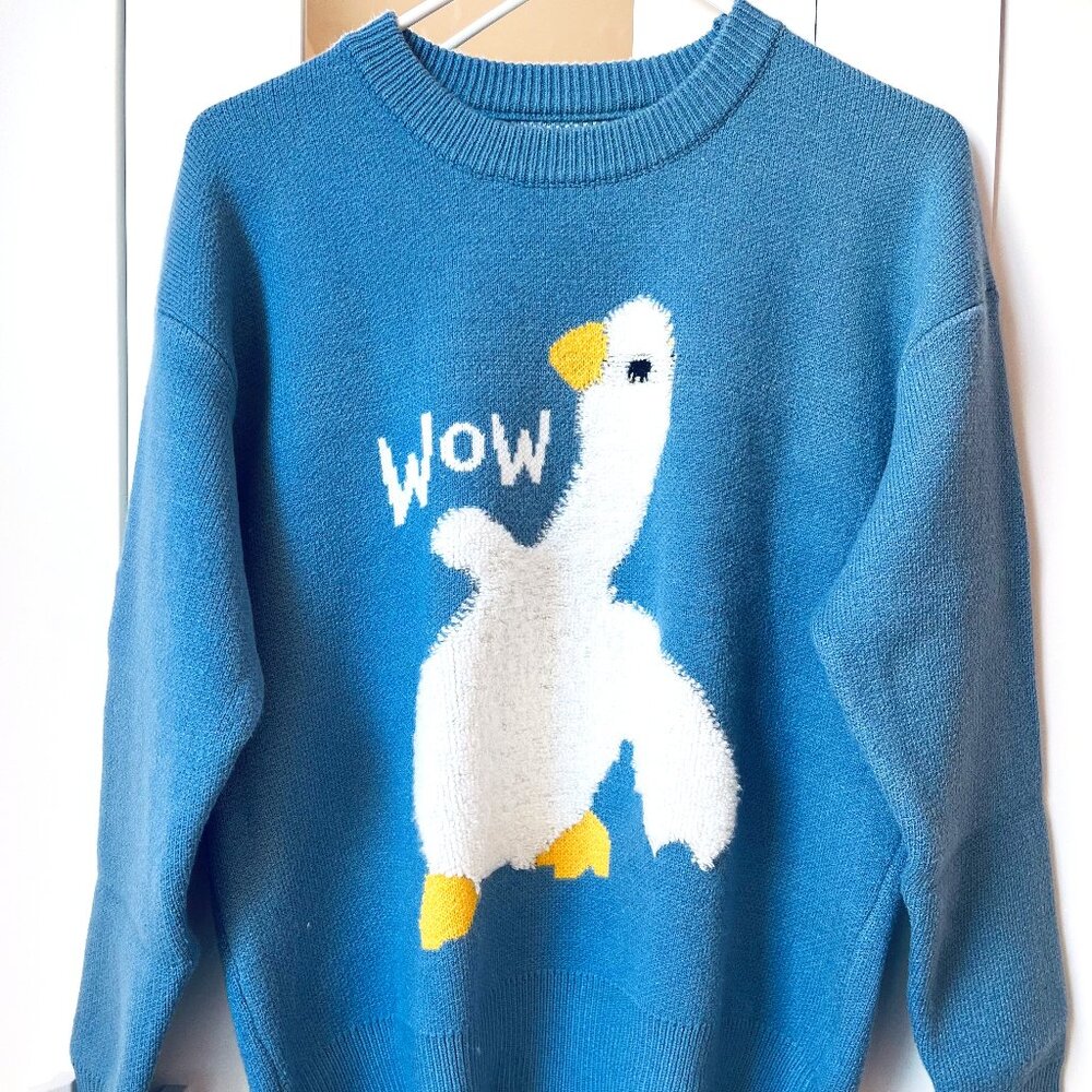Blue crew neck knitted duck sweater